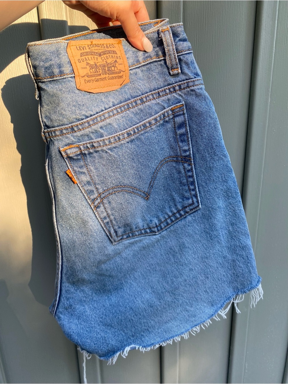 Vintage Levi’s orange tab denim cut off shorts Size 32”